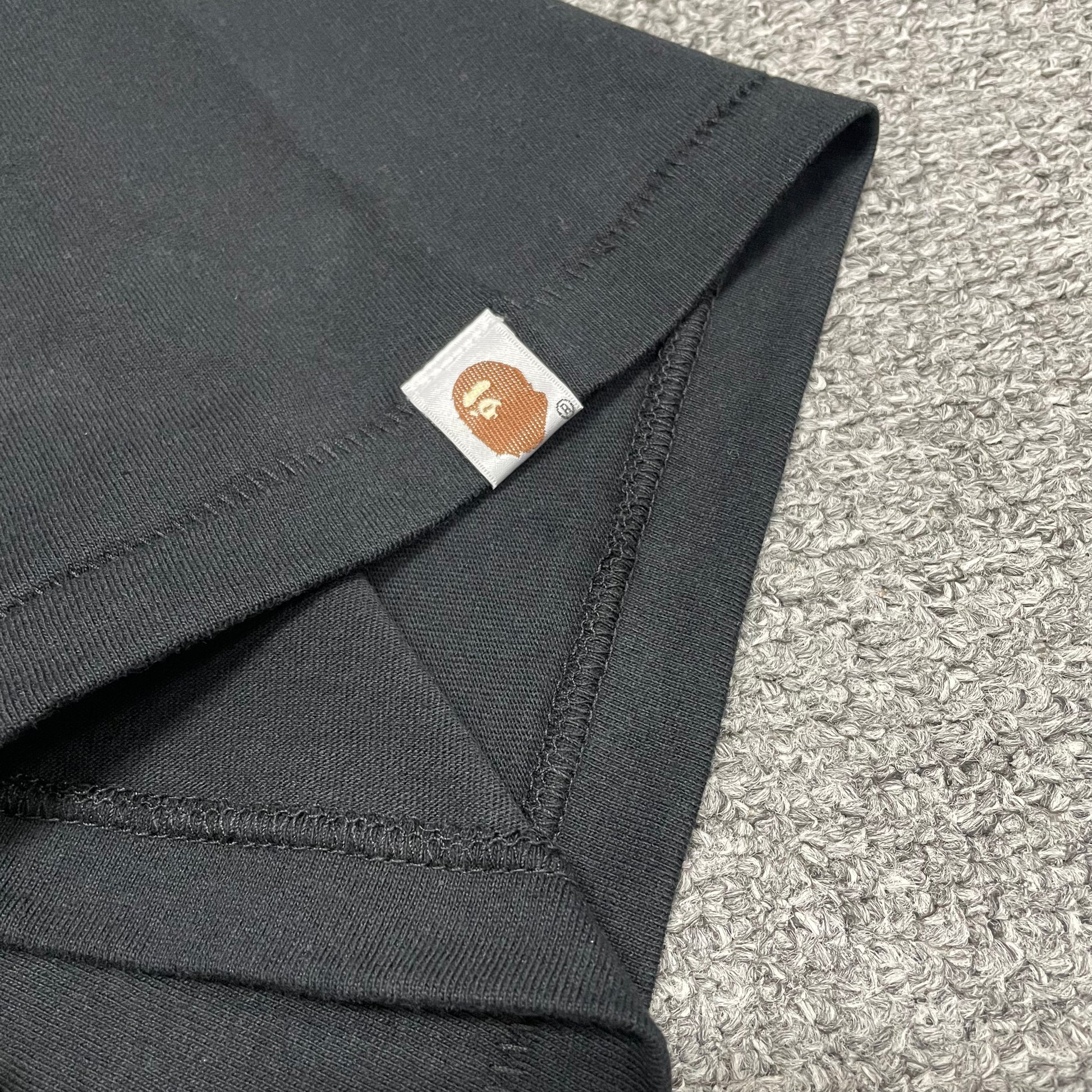 BAPE Graphic T-shirt sleeve label and stitching detail