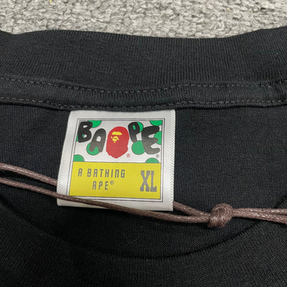 Neck label detail of black BAPE Big Ape Head T-shirt
