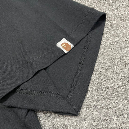 Sleeve label detail of black BAPE Color Camo Big Ape Head T-shirt