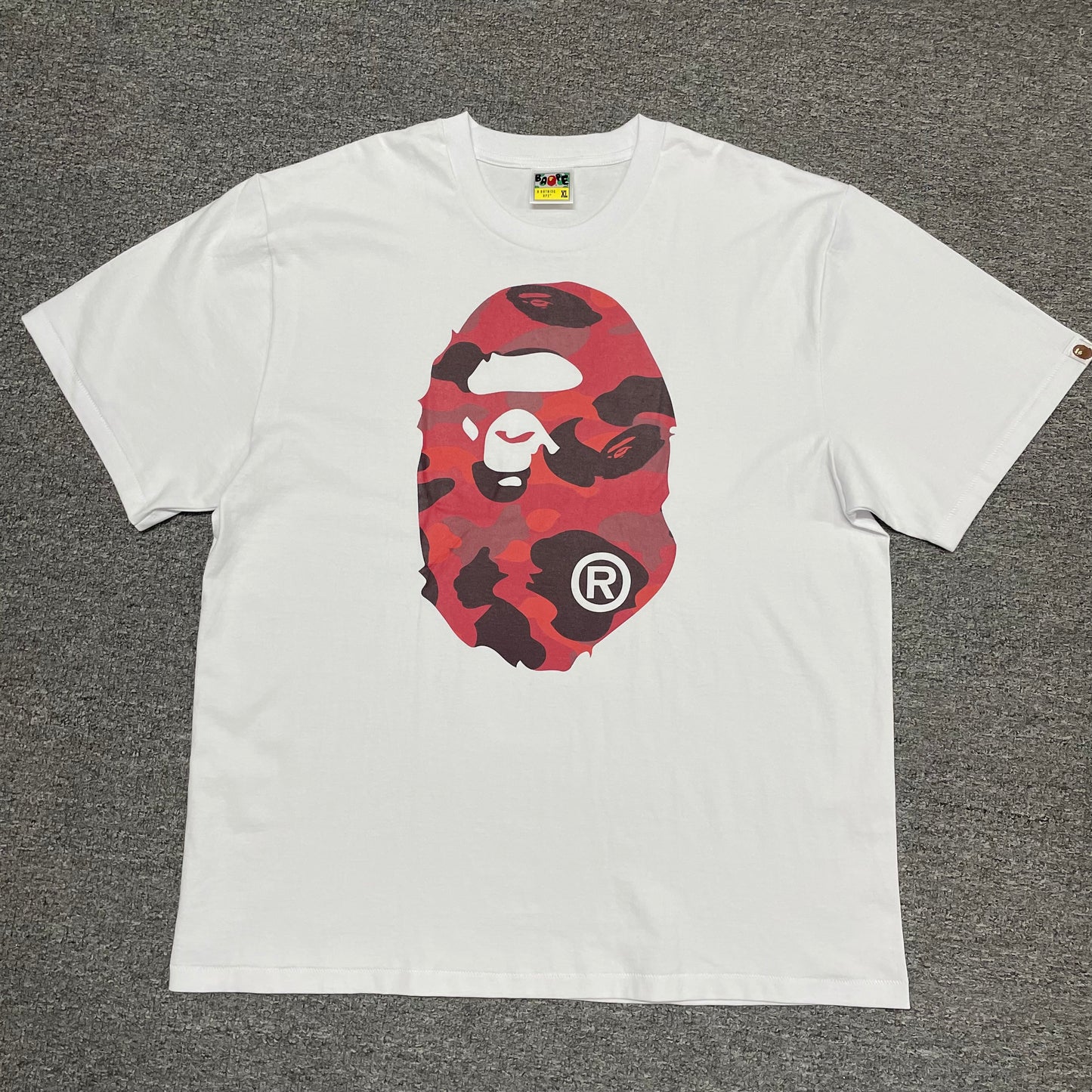 White BAPE Color Camo Big Ape Head T-shirt front view with red camo graphic