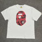 White BAPE Color Camo Big Ape Head T-shirt front view with red camo graphic