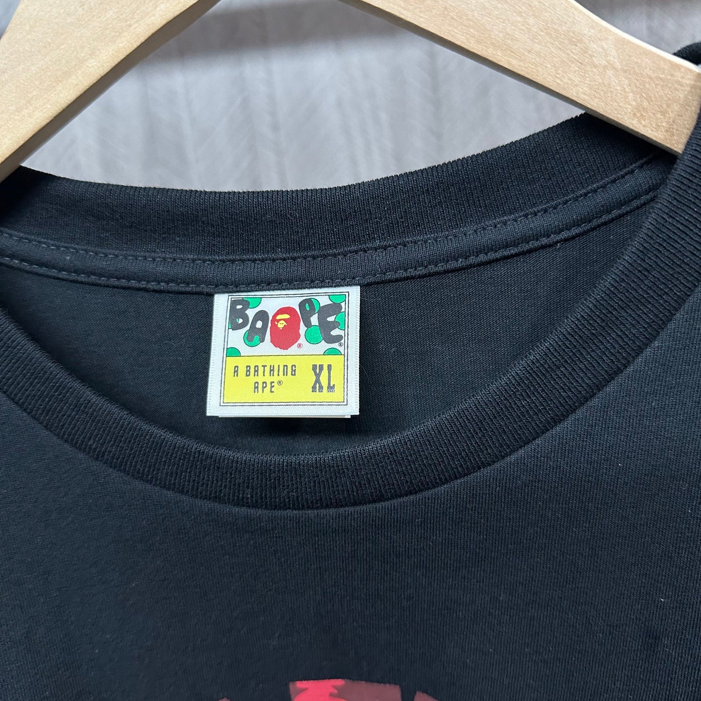 Graphic T-shirt crew neckline and woven neck label detail
