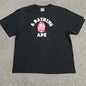 Black BAPE ABC Camo College T-shirt front view with pink camo Ape Head logo