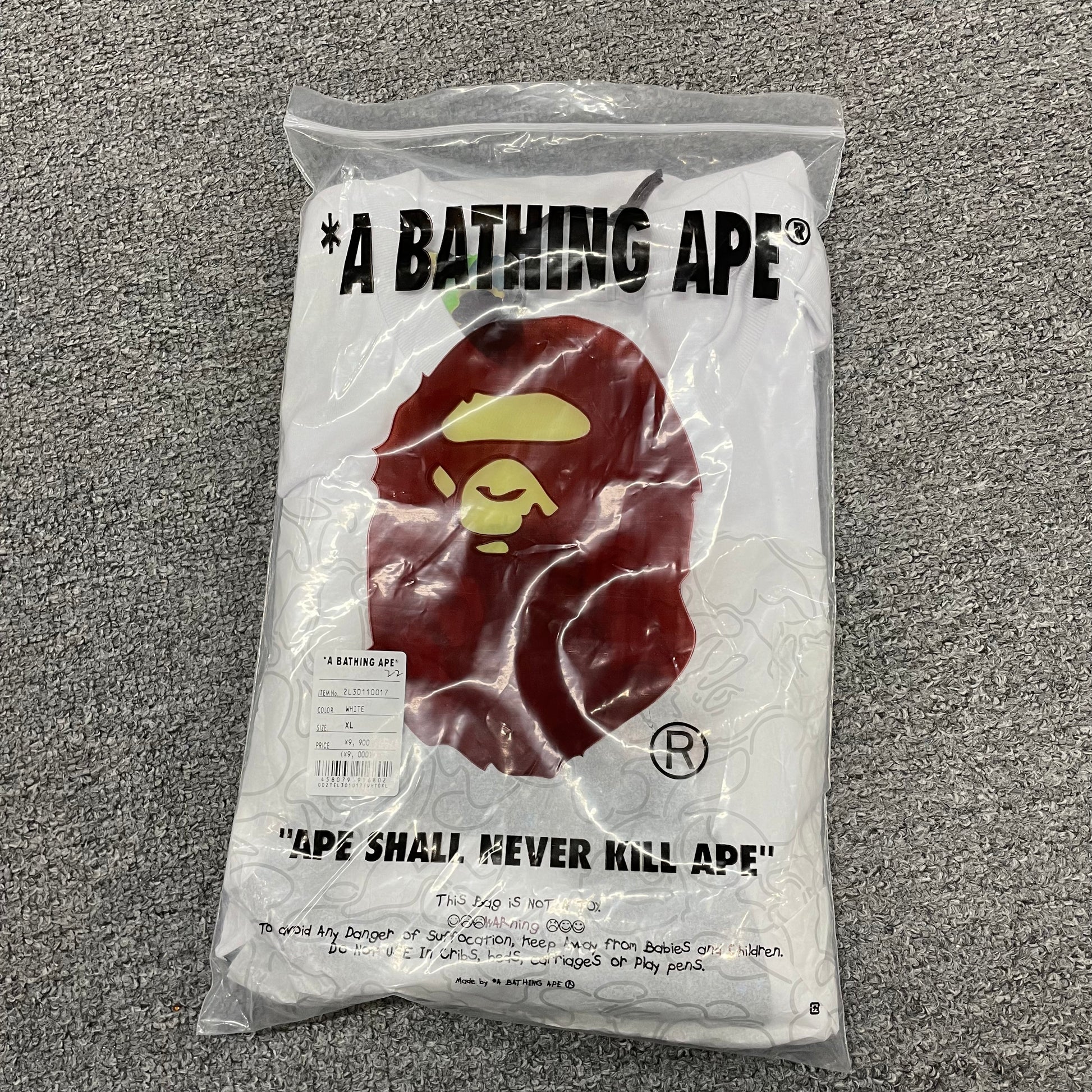 White BAPE Baby Milo Ape Head T-shirt with retail packaging bag