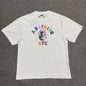 White BAPE STA College relaxed fit T-shirt front view with multicolor Ape Head graphic