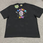 Black BAPE STA College relaxed fit T-shirt front view with multicolor Ape Head graphic