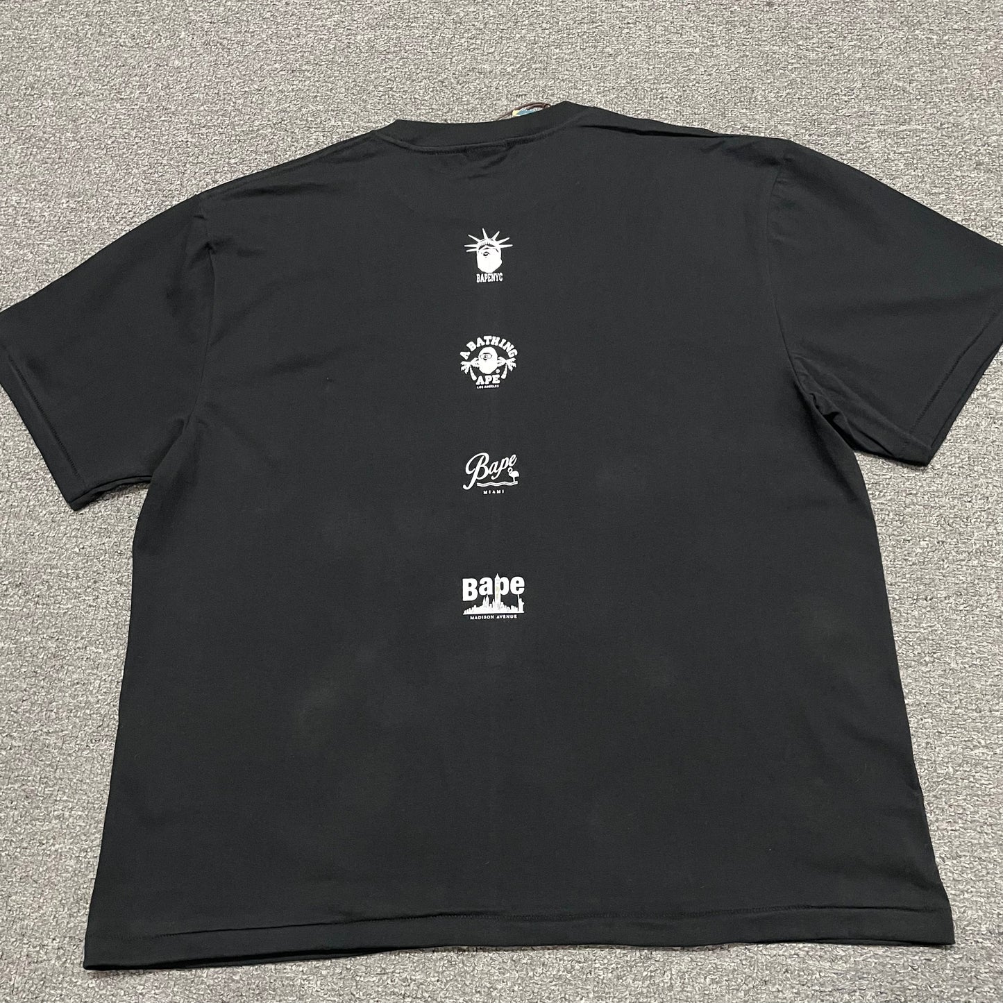 Back view of black BAPE STA College relaxed fit T-shirt
