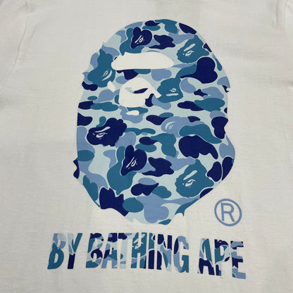 Close-up of blue camo Ape Head graphic on white BAPE T-shirt