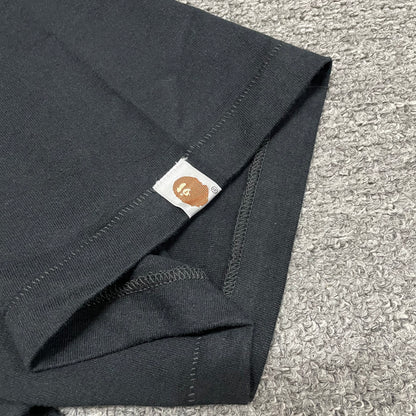BAPE Ape Head sleeve label detail on black ABC Camo College T-shirt
