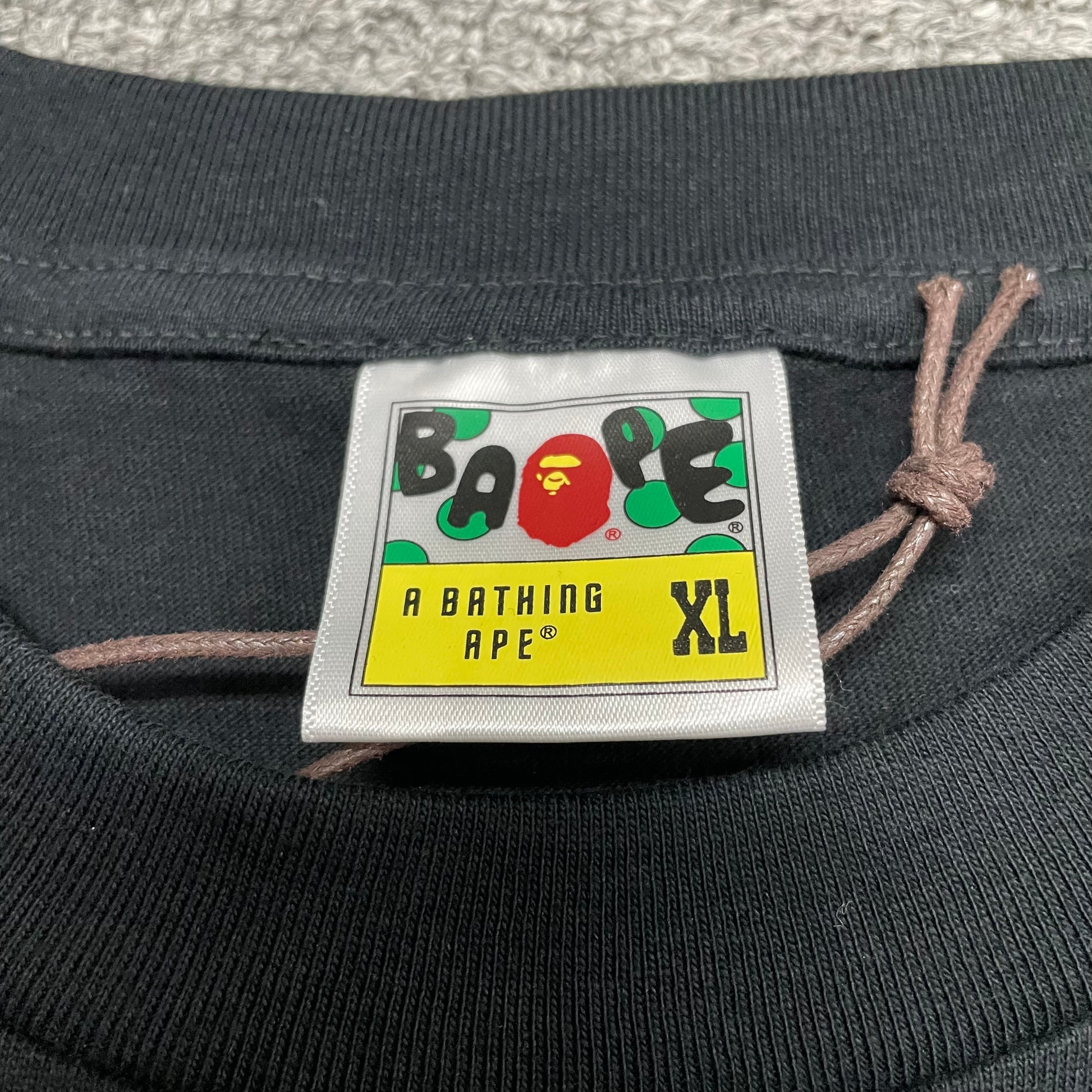 BAPE neck label detail on black ABC Camo College T-shirt