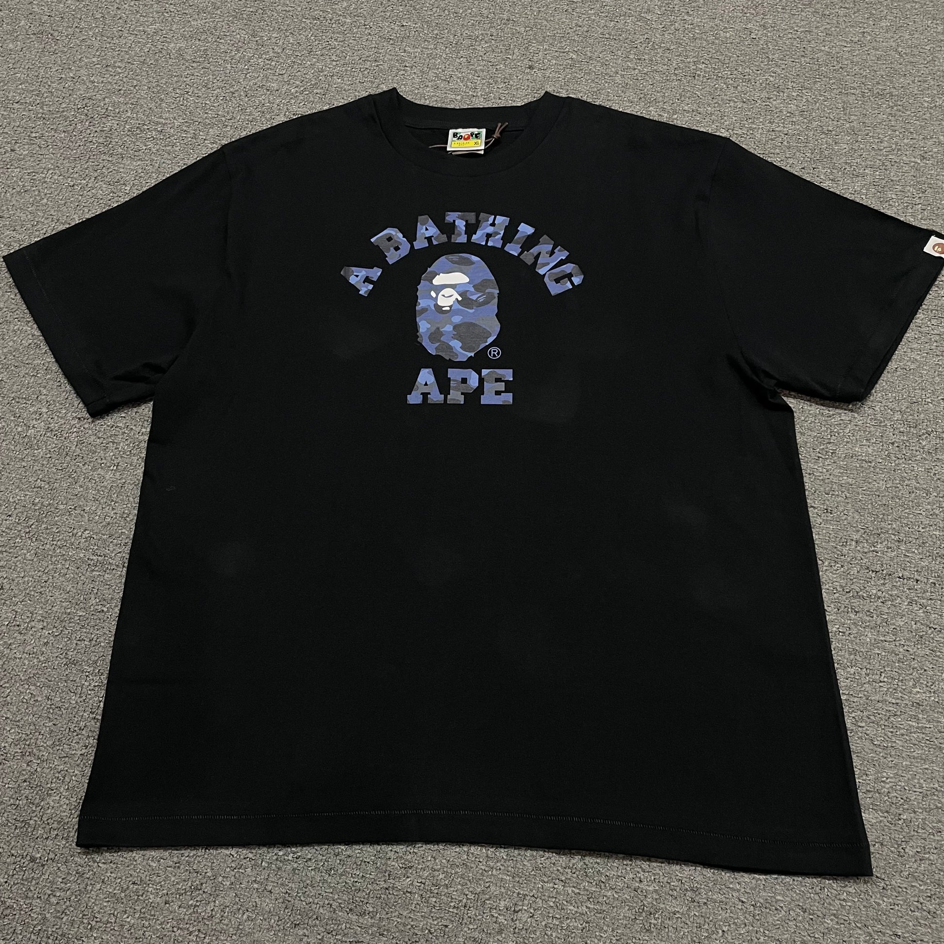 Black BAPE ABC Camo College T-shirt front view with blue camo Ape Head graphic