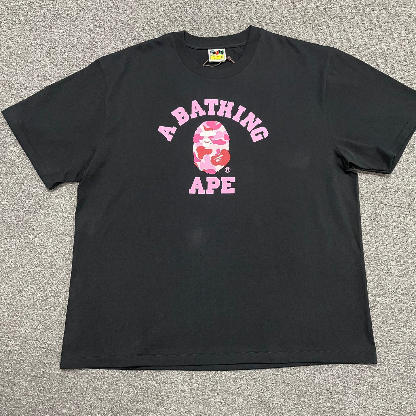 Black BAPE ABC Camo College T-shirt front view with pink camo Ape Head graphic