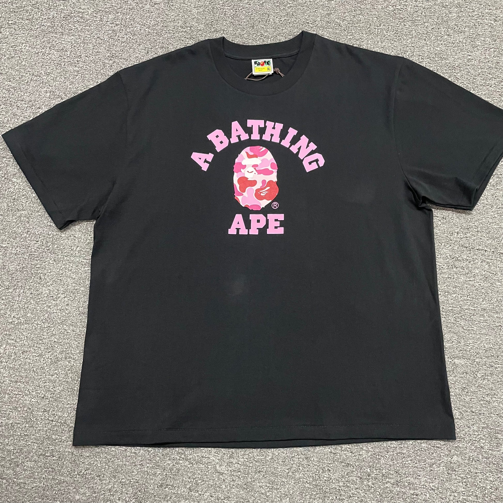 Black BAPE ABC Camo College T-shirt front view with pink camo Ape Head graphic