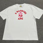 White BAPE ABC Camo College T-shirt front view with pink camo Ape Head graphic