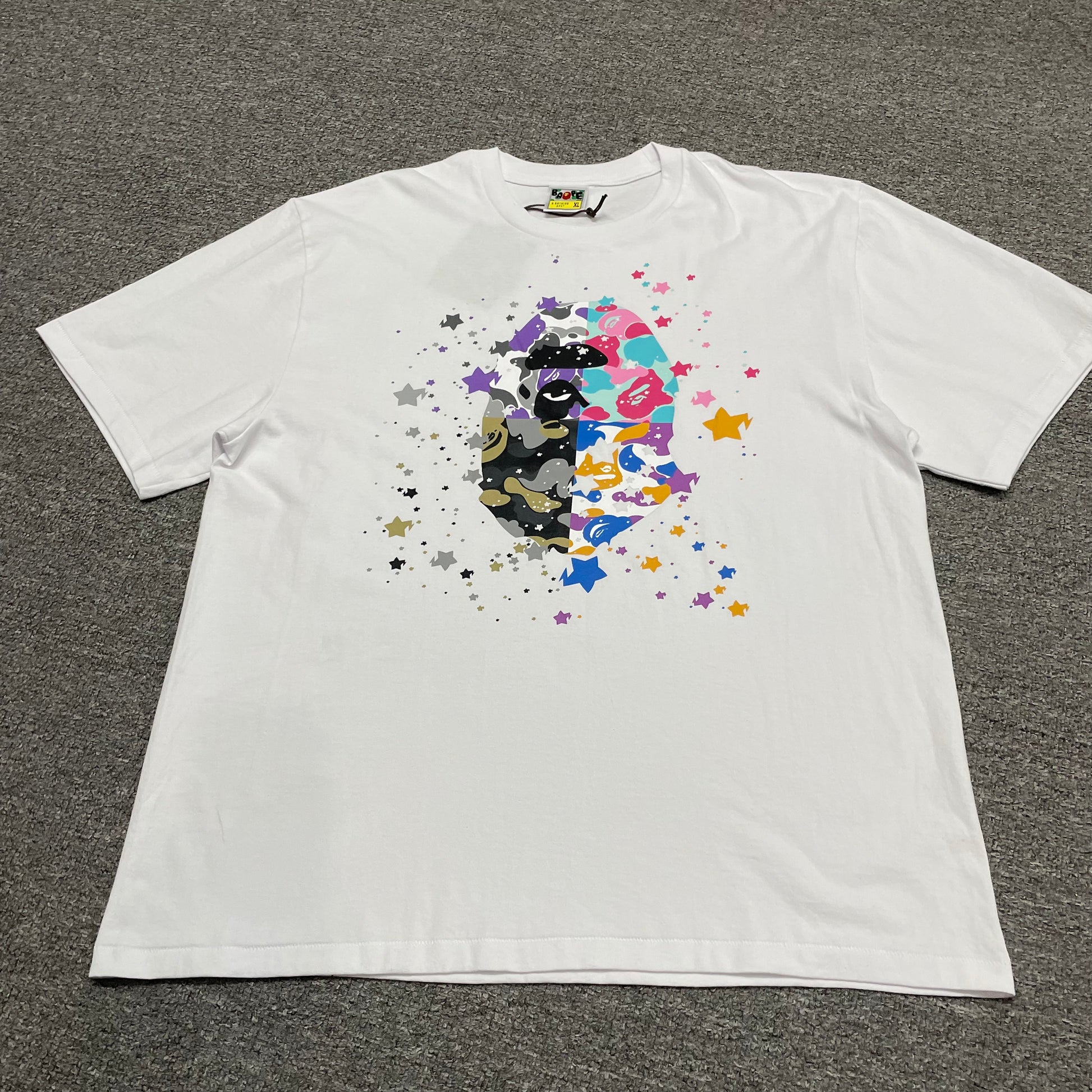 White BAPE US Ape Head STA T-shirt front view with multicolor graphic