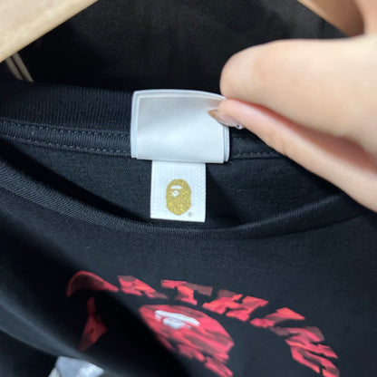 Graphic T-shirt crew neckline and woven neck label detail