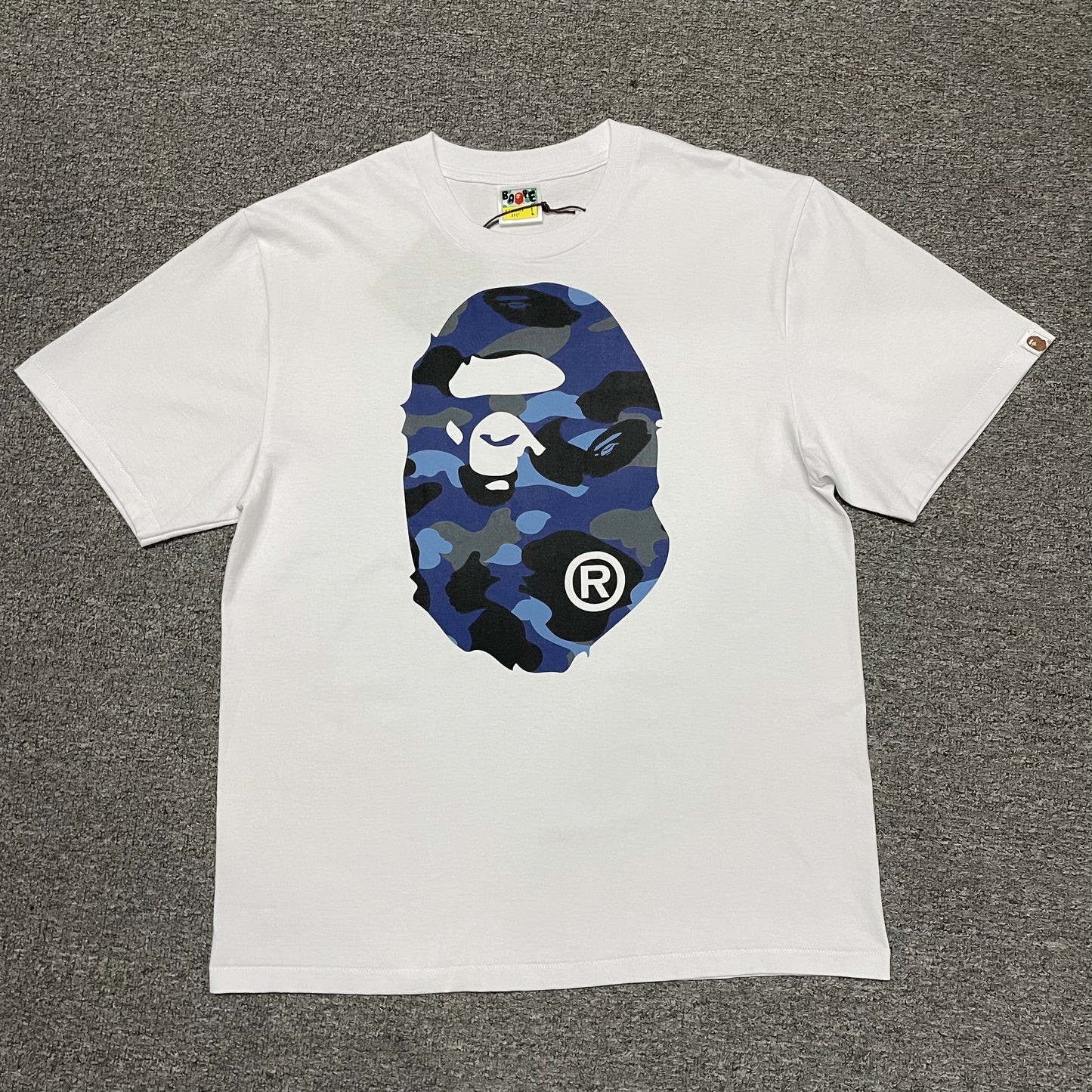 White BAPE ABC Camo Big Ape Head T-shirt front view with blue camo graphic