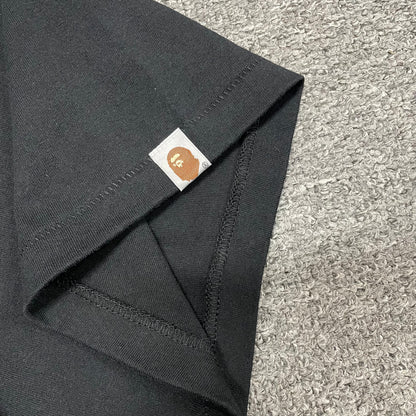 BAPE Ape Head sleeve label detail on black ABC Camo T-shirt