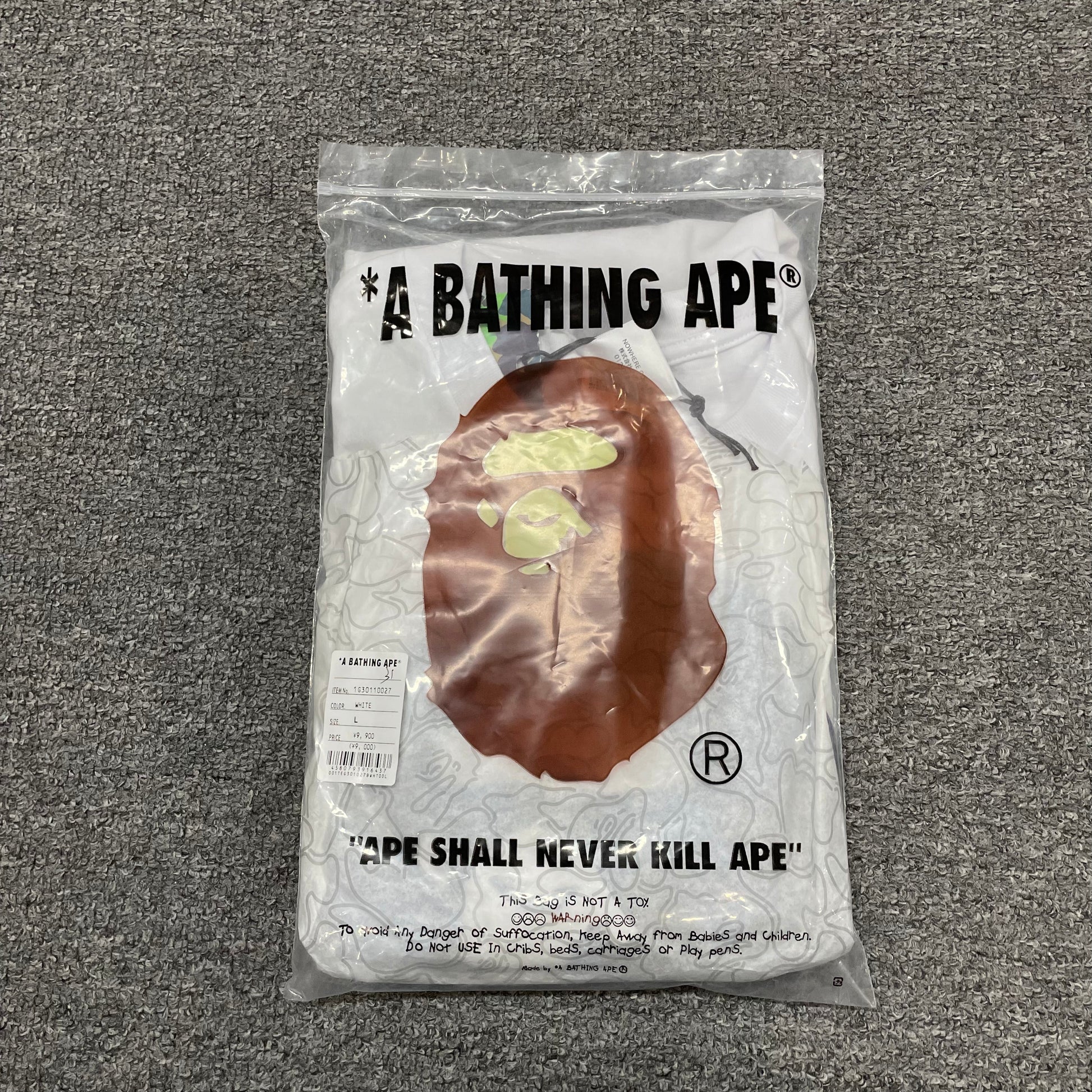 White and blue BAPE ABC Camo Big Ape Head T-shirt with retail packaging bag