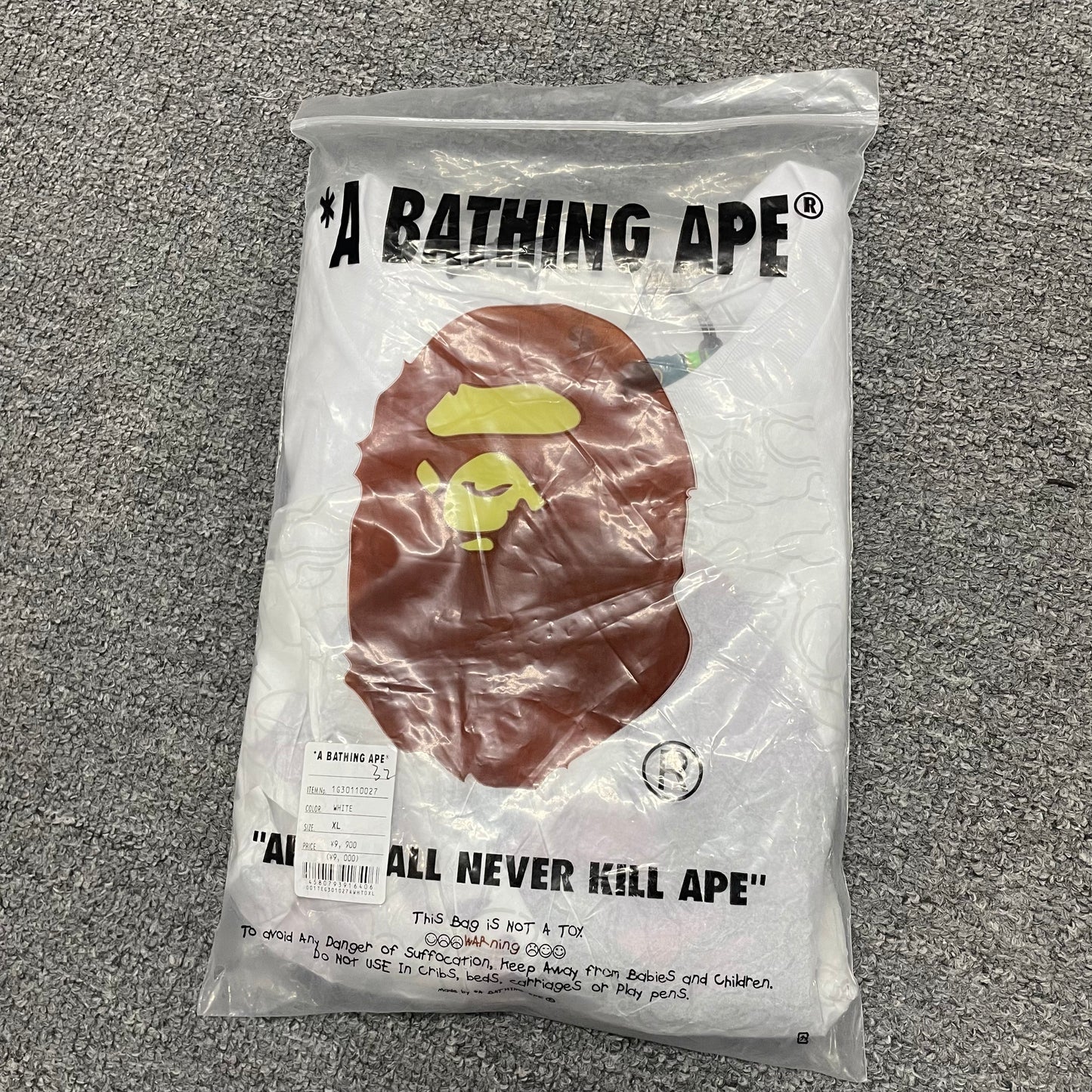 White and purple BAPE Color Camo Big Ape Head T-shirt with retail packaging bag