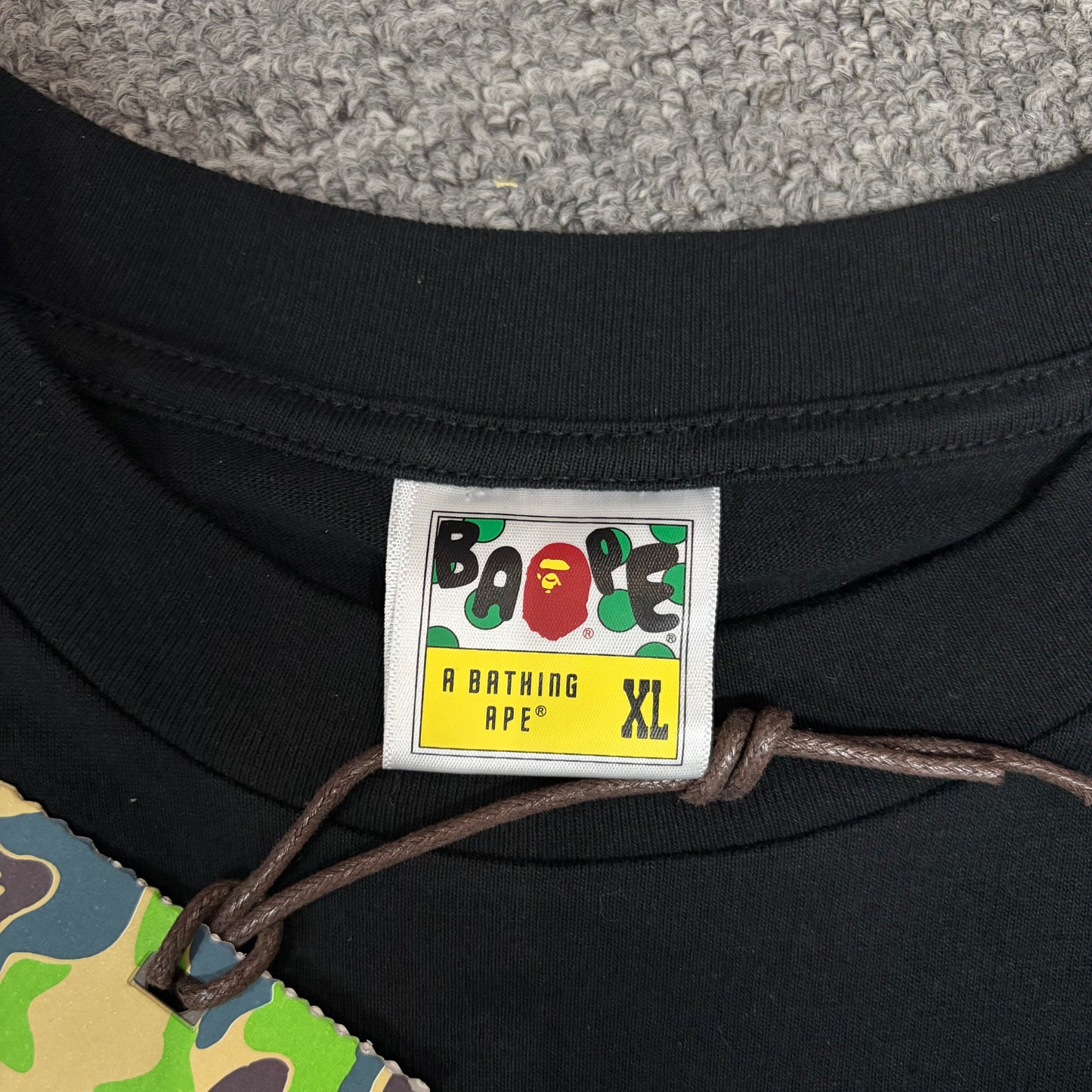 BAPE neck label detail on black Chrome Hearts collaboration T-shirt