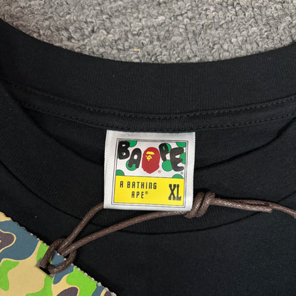 BAPE neck label detail on black Chrome Hearts collaboration T-shirt