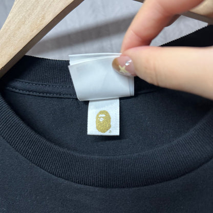 Graphic T-shirt crew neckline and woven neck label detail