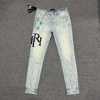 AMIRI Painter Staggered Logo Skinny Jeans Bleach Indigo