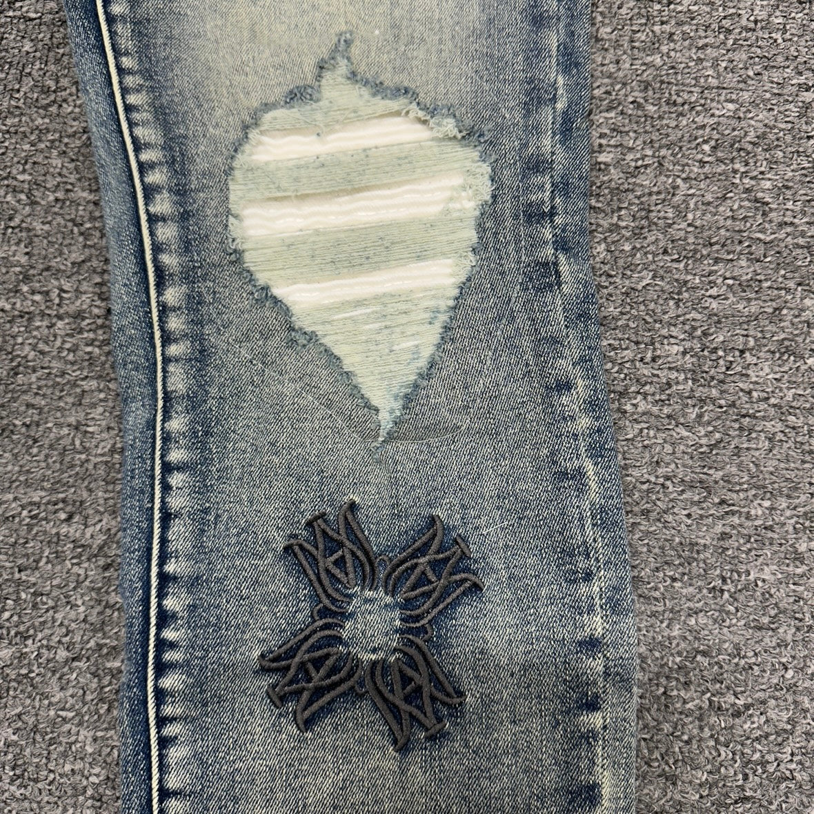 AMIRI Multicolor MA Quad Appliqué Distressed Jeans