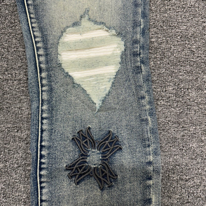 AMIRI Multicolor MA Quad Appliqué Distressed Jeans