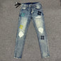AMIRI Multicolor MA Quad Appliqué Distressed Jeans