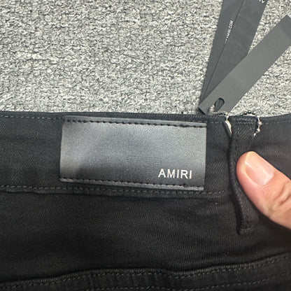 AMIRI Staggered Logo Skinny Jeans Black Gold