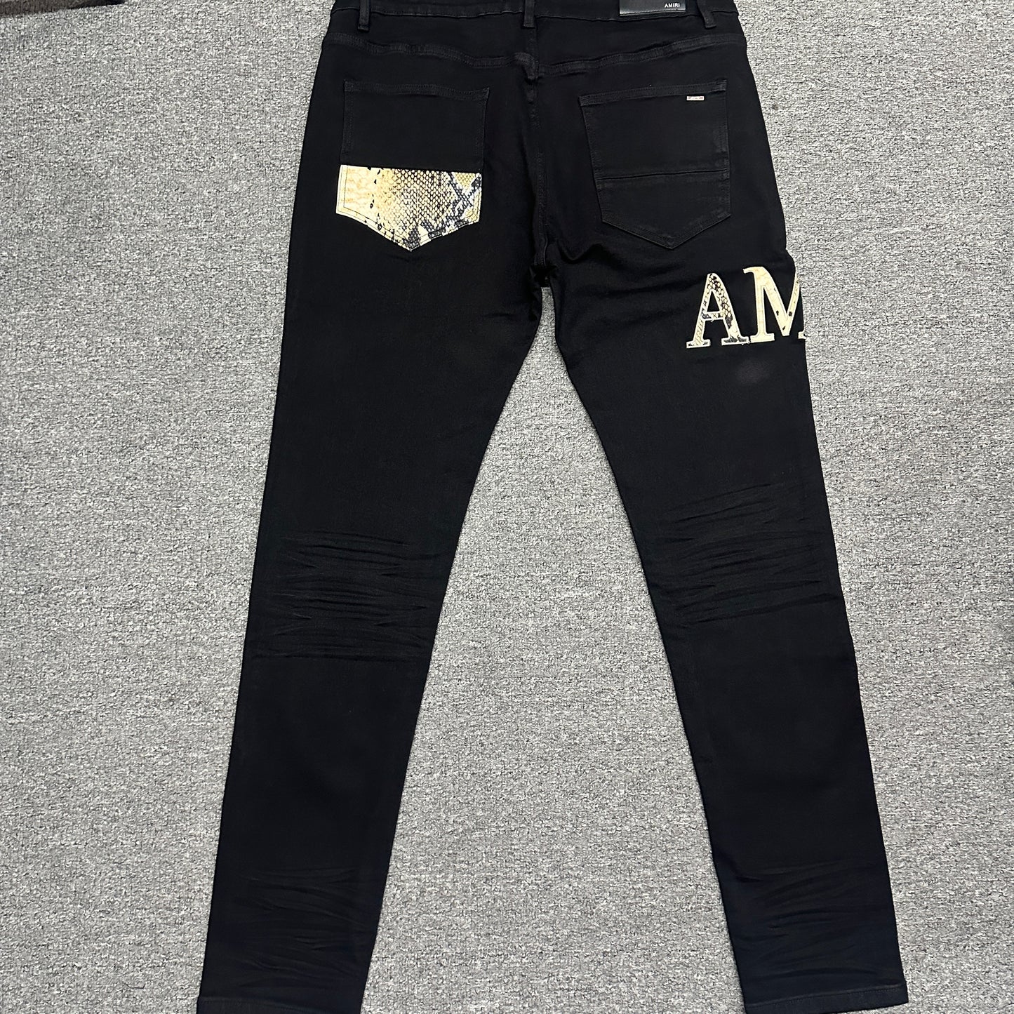 AMIRI Staggered Logo Skinny Jeans Black Gold