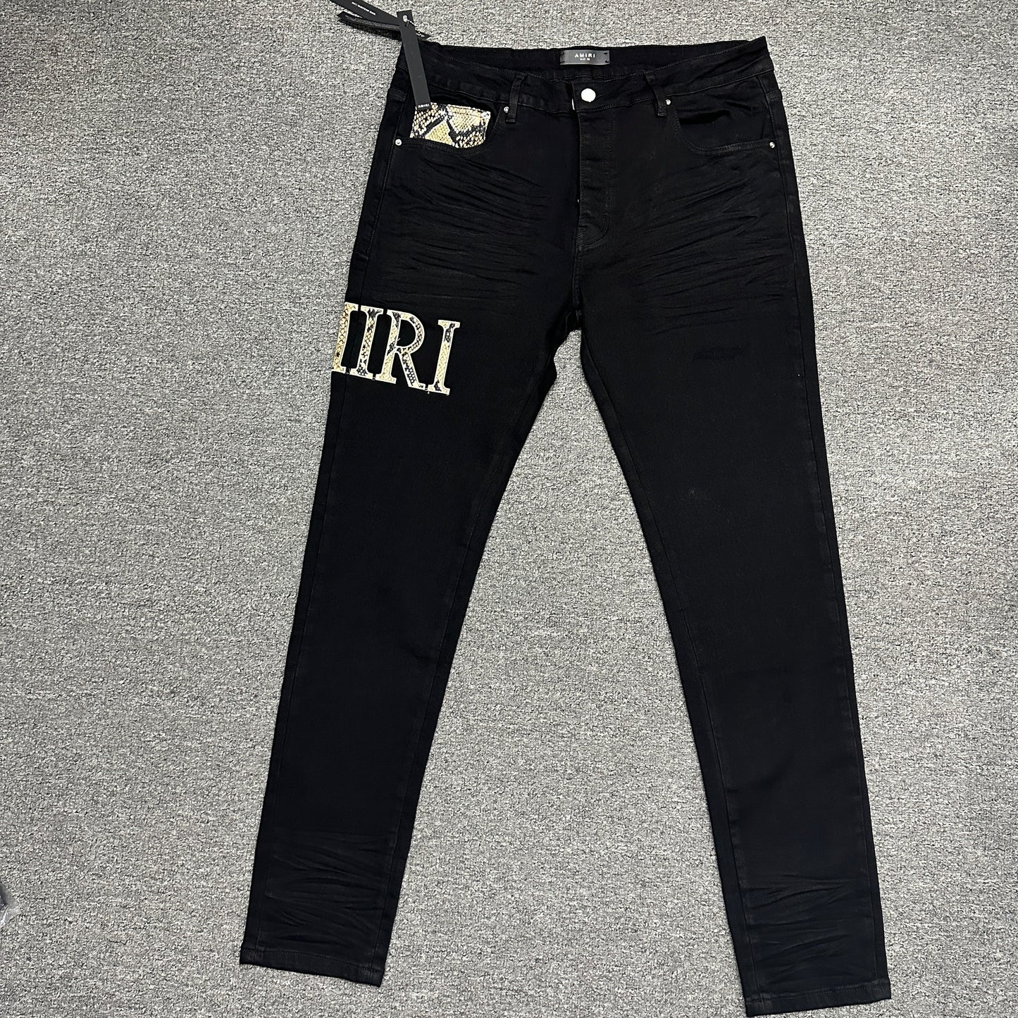 AMIRI Staggered Logo Skinny Jeans Black Gold