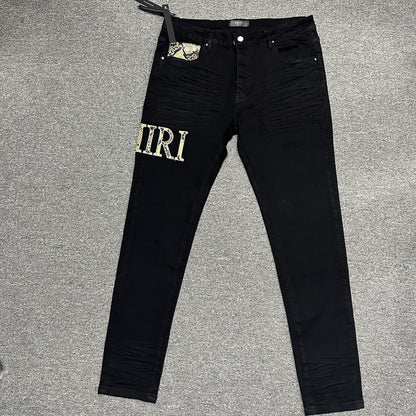 AMIRI Staggered Logo Skinny Jeans Black Gold