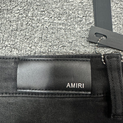 AMIRI Painter Staggered Logo Skinny Jeans Washed Black