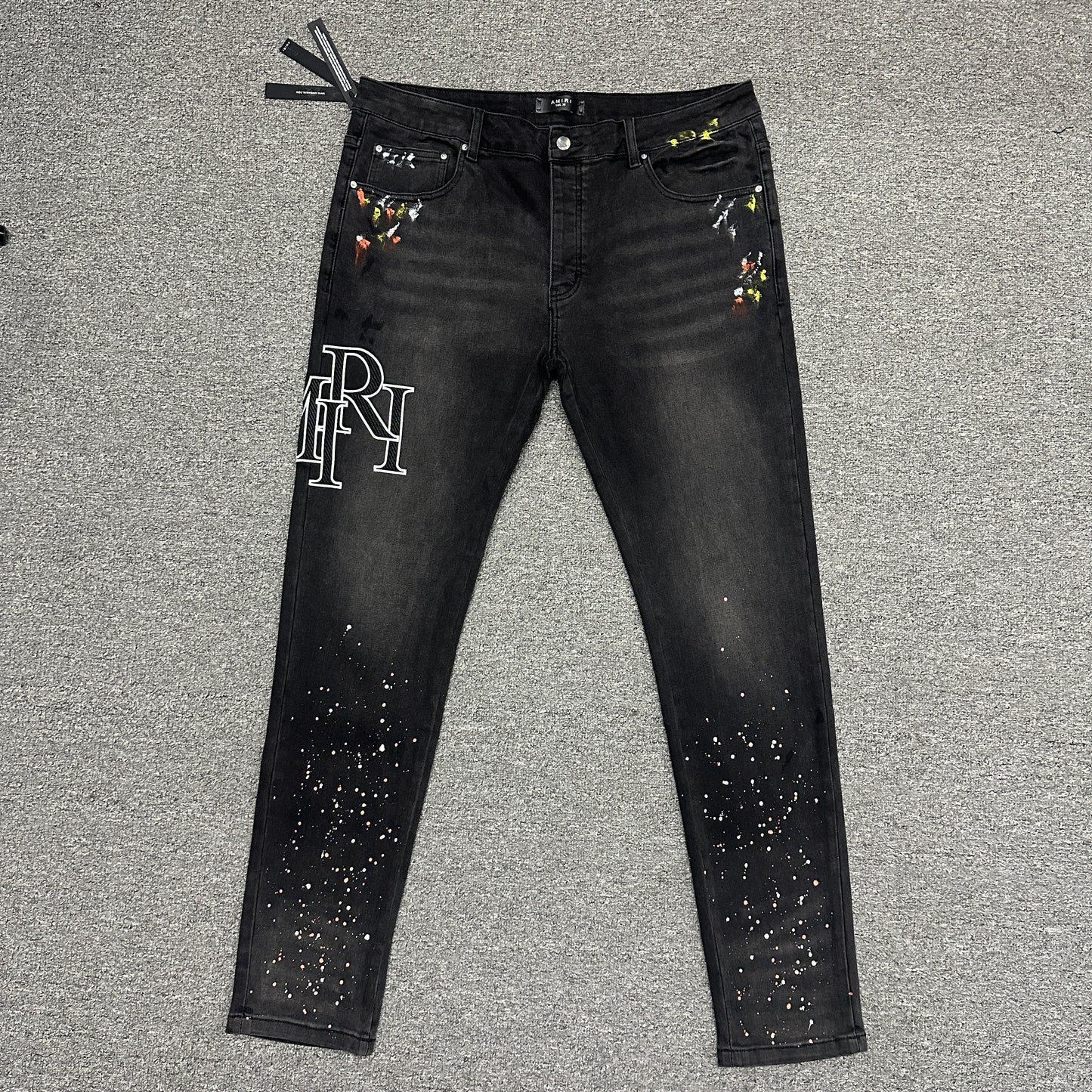 AMIRI Painter Staggered Logo Skinny Jeans Washed Black