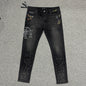 AMIRI Painter Staggered Logo Skinny Jeans Washed Black