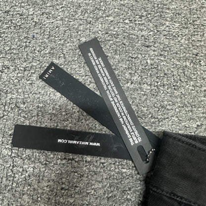 AMIRI Painter Staggered Logo Skinny Jeans Washed Black