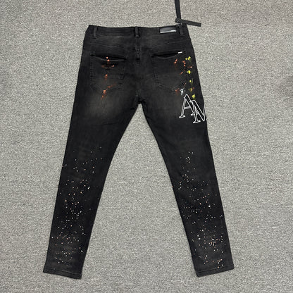 AMIRI Painter Staggered Logo Skinny Jeans Washed Black