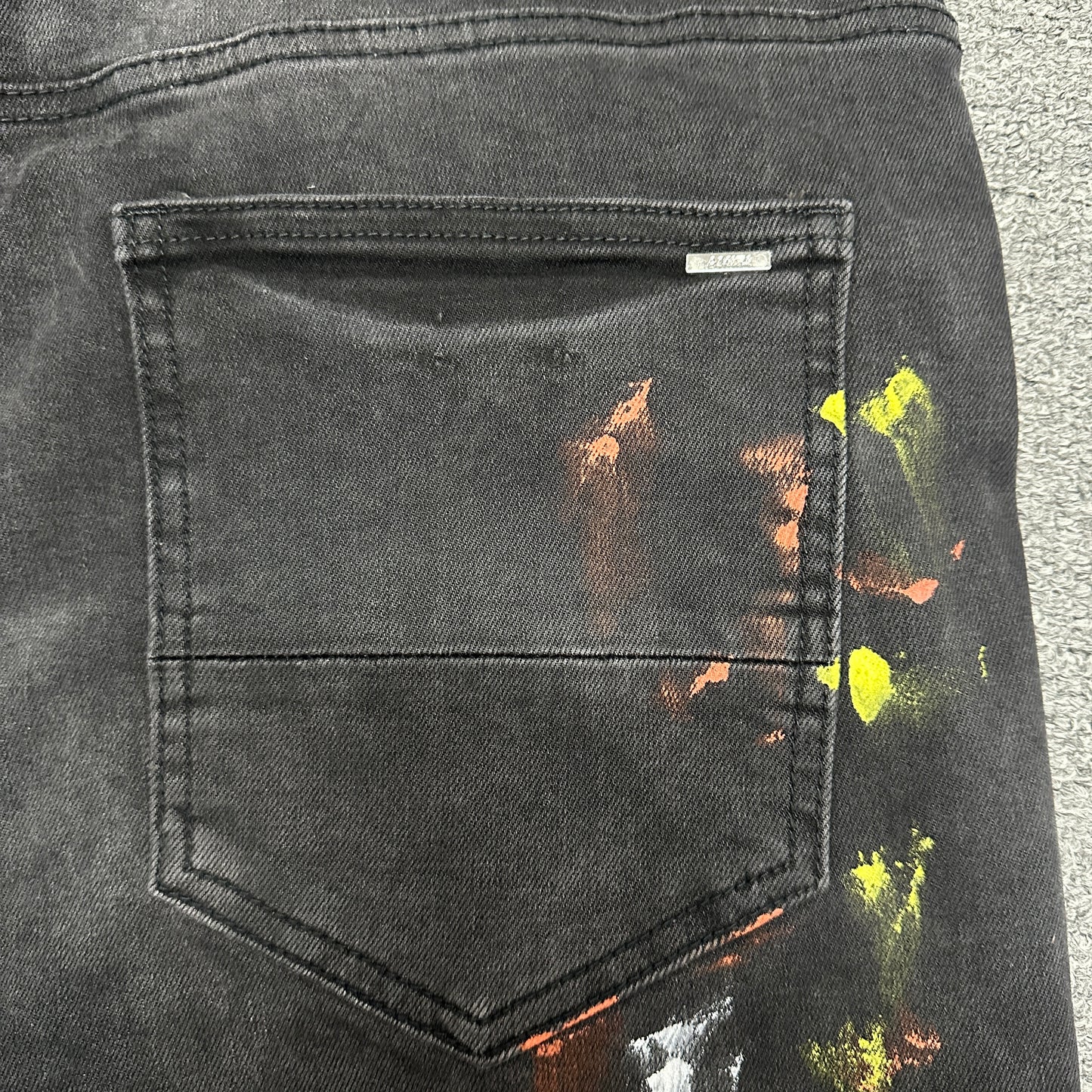 AMIRI Painter Staggered Logo Skinny Jeans Washed Black