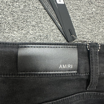 AMIRI Western Patch Distressed Jeans Faded Black