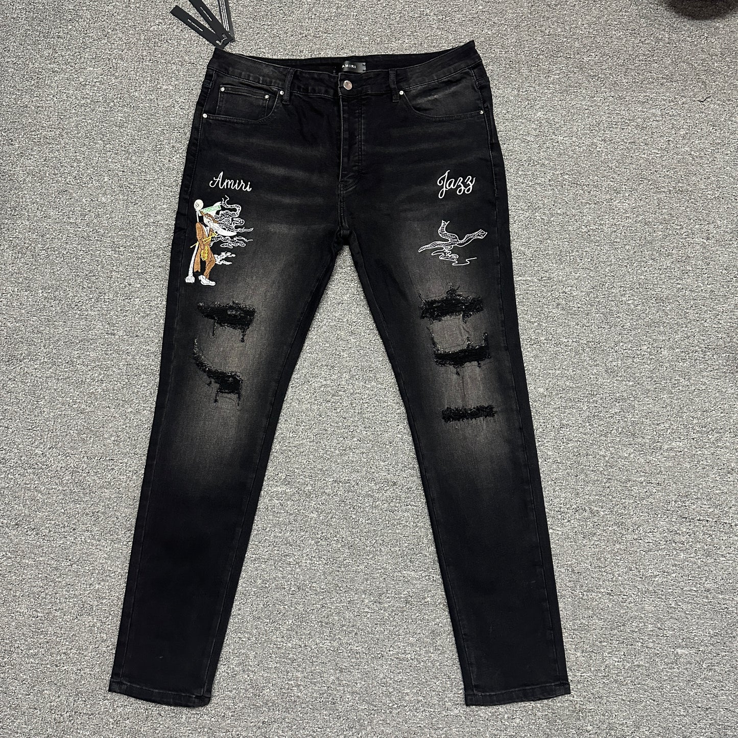 AMIRI Western Patch Distressed Jeans Faded Black