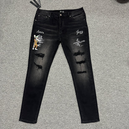 AMIRI Western Patch Distressed Jeans Faded Black