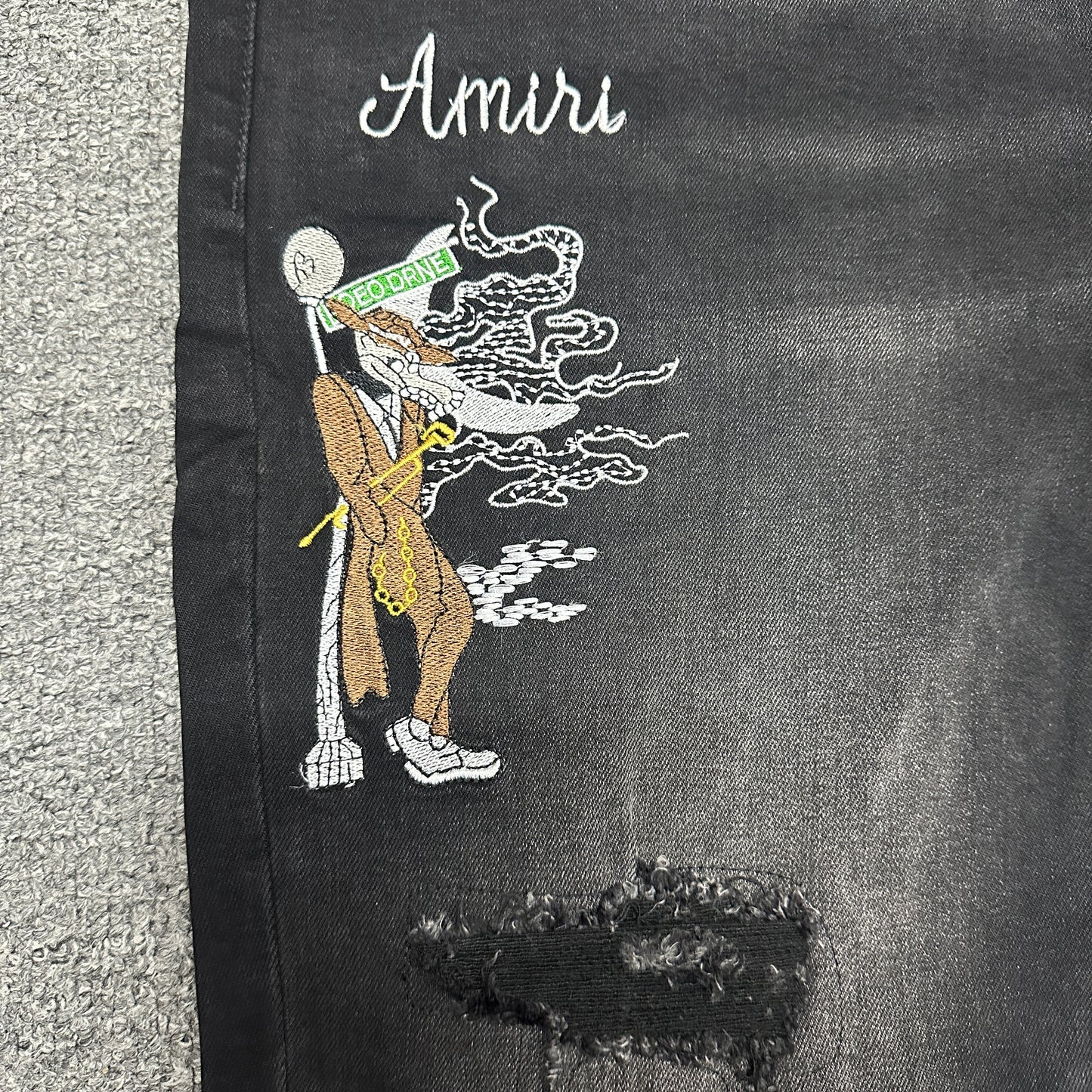 AMIRI Western Patch Distressed Jeans Faded Black