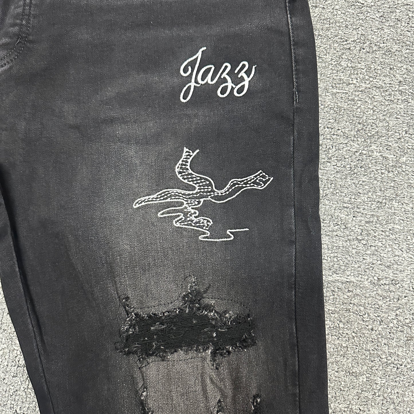 AMIRI Western Patch Distressed Jeans Faded Black