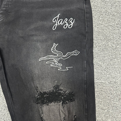 AMIRI Western Patch Distressed Jeans Faded Black