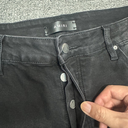 AMIRI Western Patch Distressed Jeans Faded Black