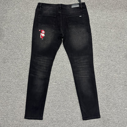 AMIRI Western Patch Distressed Jeans Faded Black