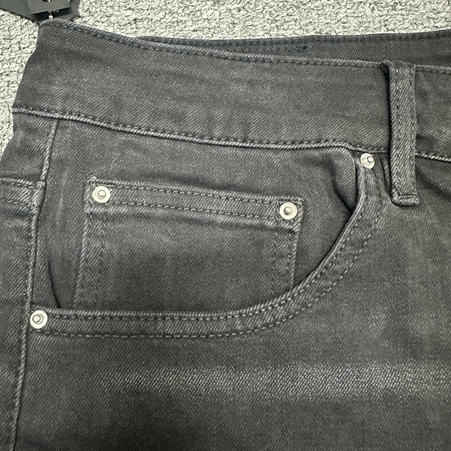 AMIRI Staggered Logo Distressed Skinny Jeans Washed Black